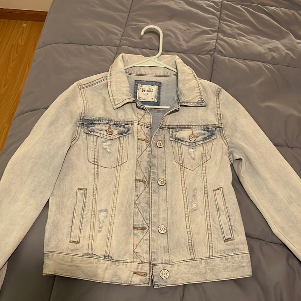 Distressed denim jacket
